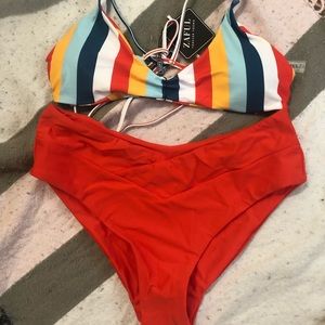 Women’s NWT suit size L (women’s 8) top/bottom